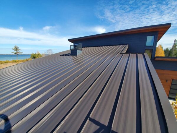 Discover the beauty and durability of metal roofing with expert installation from Norm's Roofing.