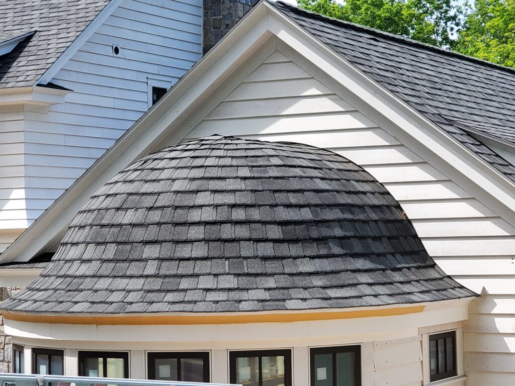 Expert Shingle installation by Norm's Roofing in Northern Michigan