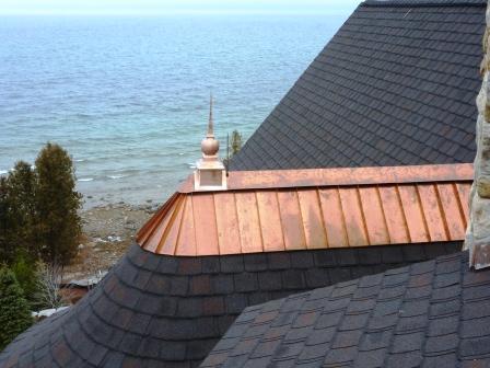 gorgeous lakeside copper roofing in Northern Michigan, installed by roofing experts Norm Roofing