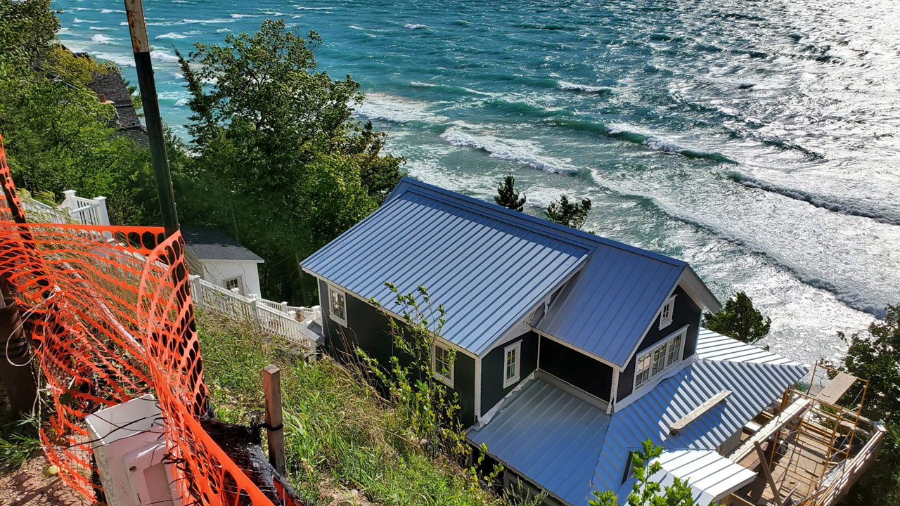 Gorgeous lakeside metal roofing installed by Norm's Roofing